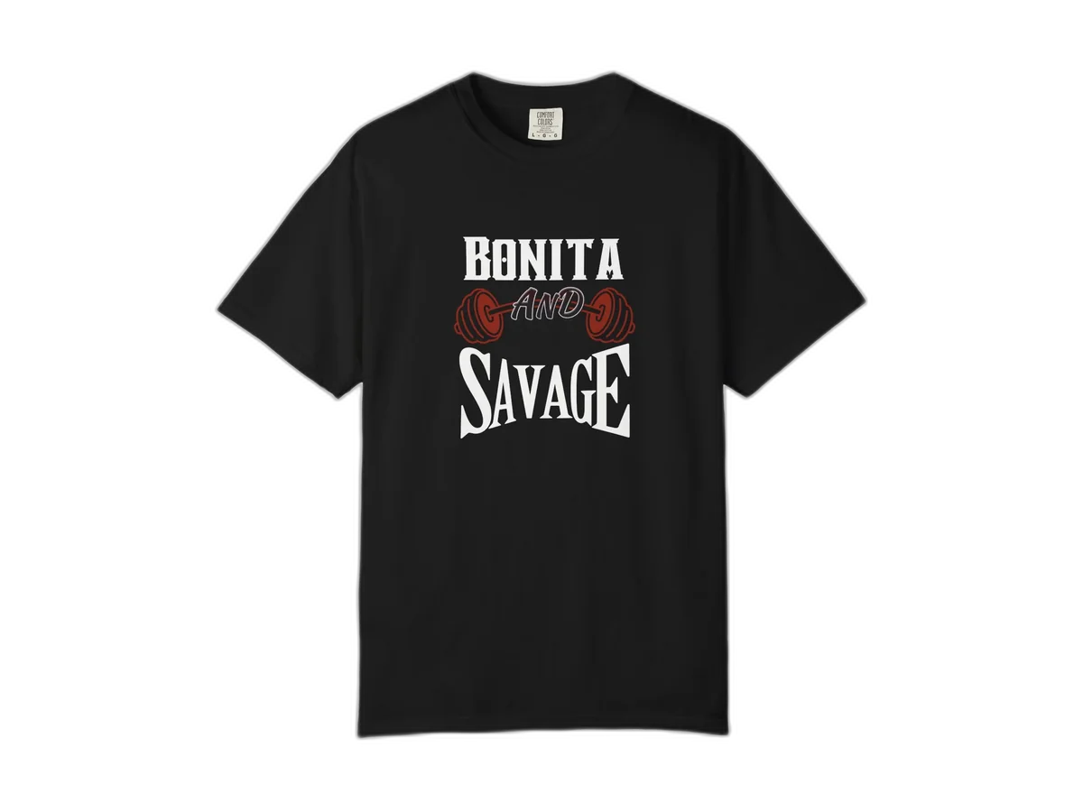 Black Latina Muscle Bonita and Savage cotton tee, shown alone on a transparent background.