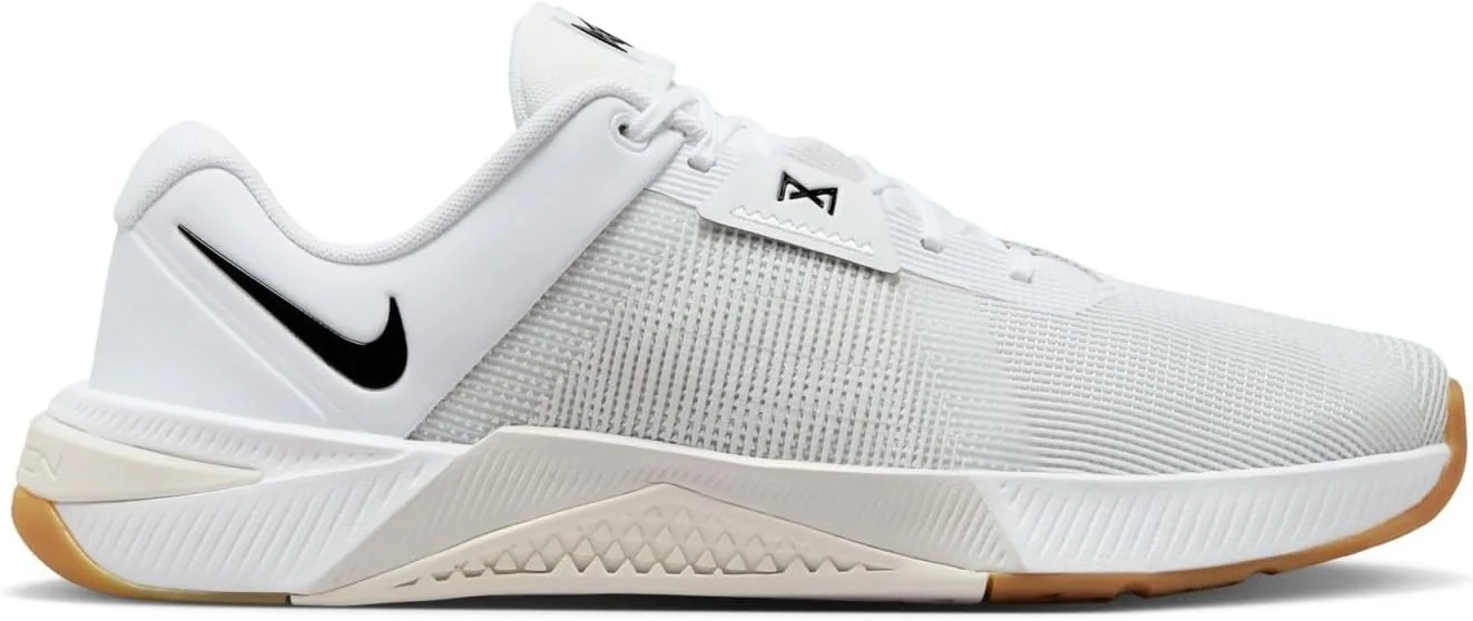 Nike Metcon 10 cross-training shoe in white with black details and a gum outsole.